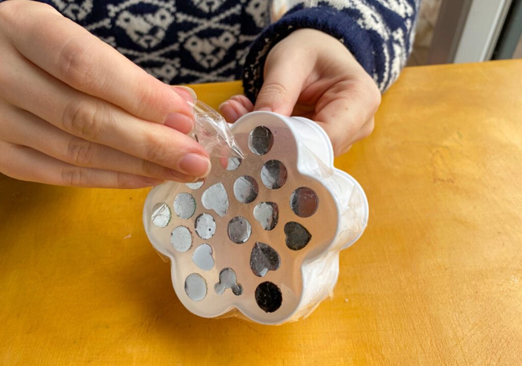 Peel the silicone from the container of the custom silicone mold