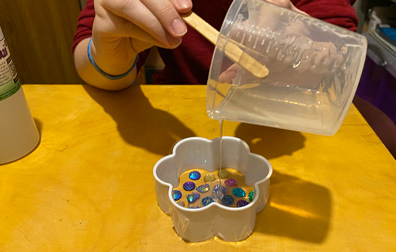 Pour the silicone rubber mixture into the container to make a custom silicone mold