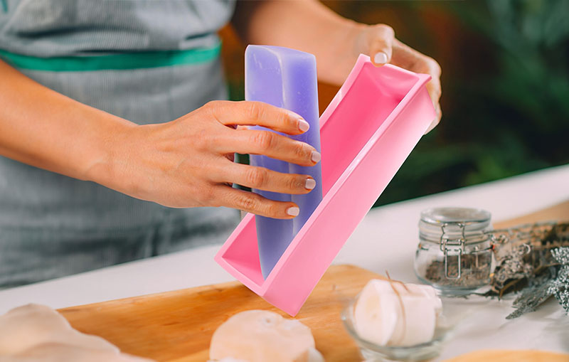 Soap making - Handmade soap being removed from a soap silicone mold