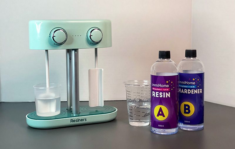 Resiners Dual-Head Resin Mixer with resin and hardener bottles.